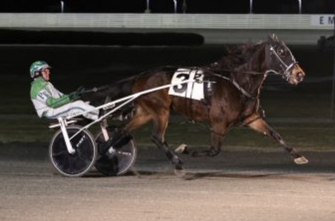 Peter Kleinhans driving at the track at night